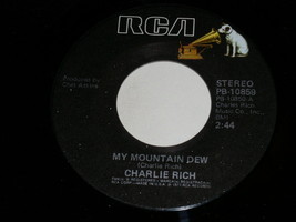 An item in the Music category: Charlie Rich My Mountain Dew Nice N Easy 45 Rpm Record RCA Label