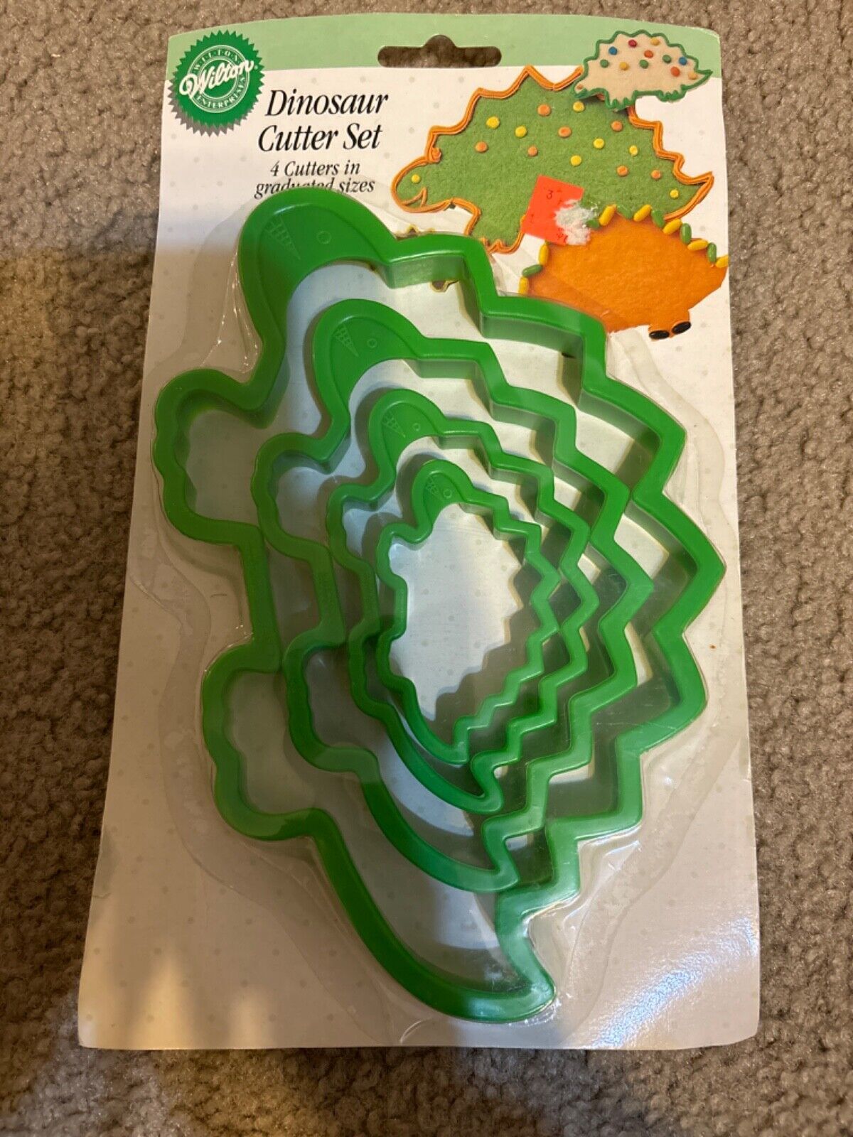 Wilton Dinosaur 4 Graduated Cookie Cutter Set Green New on the Card NOS 1994 - $11.29
