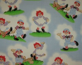 Raggedy Ann &amp; Andy Playtime Clouds Fleece Fabric© Simon &amp; Schuster, Inc. License - £39.16 GBP