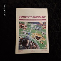 Atari 2600 demons to diamonds game manual in excellent condition  - $92.05 MXN