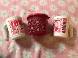 NEW 2 TUPPERWARE LOVE AMORE 11oz MUGS + MINI GRAPHIC HEART SPARKLE MINI ... - $183.42 MXN NEW 2 TUPPERWARE LOVE AMORE 11oz MUGS + MINI GRAPHIC HEART SPARKLE MINI ... - $183.42 MXN