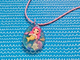 Mermaid Charm Bundle, including resin charm, necklace, mini flashlight, ... - $11.00