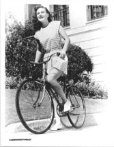 Marguerite Chapman in summer dress riding bike 1940&#39;s original 8x10 photo - £19.72 GBP
