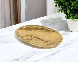 8&quot; Gold Cast Iron Mod Abstract Face Oval Trinket Tray - $1,127.04 MXN