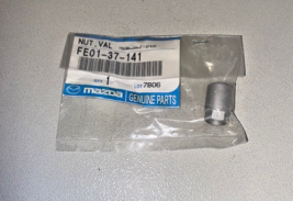 2004-2006 GENUINE MAZDA TPMS SENSOR NUT, NEW OEM PART, PART NUMBER FE013... - $14.84