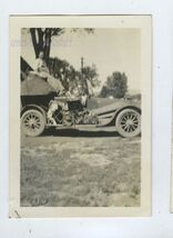 SNAPSHOT from Album * people in car loaded high lady sitting on top of load - $7.95