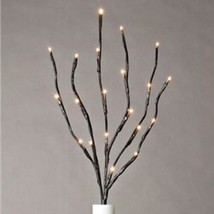 27 in Twig stem with white lights - Battery Operated - $353.97 MXN