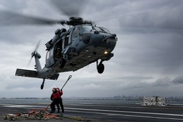Sailors hook cargo slings to Sikorsky MH-60S Seahawk helicopter Photo Print - $8.81+