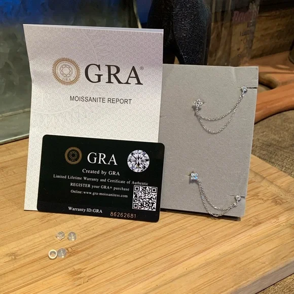 Double pierced chain Moissanite earrings - $150.00