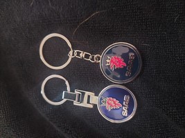 saab keychain - $296.36 MXN