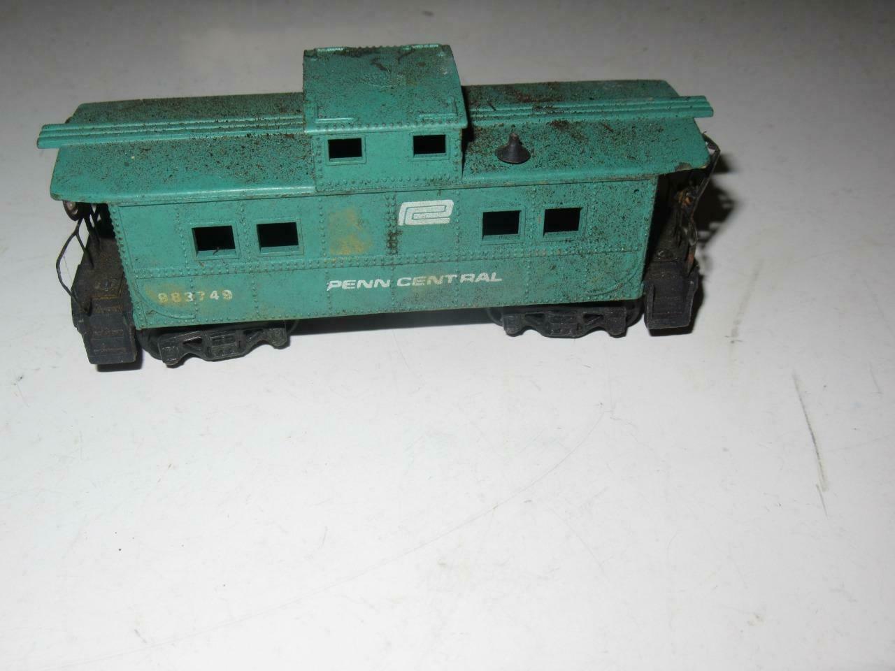 HO - PENN CENTRAL CABOOSE- FAIR- NEEDS COUPLERS - W79 - $2.74