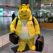 Yellow Hippopotamus mascot costume character dressed with a Jacket and Messenger - £970.21 GBP