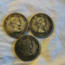 Three 3 x Canadian dollars coins queen Elizabeth ll 1963, 1957, 1956 - $55.00