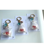 crab lucky box keychain - $220.50 MXN