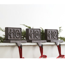 Set of Three Cast Iron Ho Ho Ho Stocking Holders - $73.73