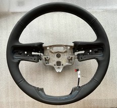 Factory original black leather steering wheel for some 2019+ GMC Sierra ... - $28.49