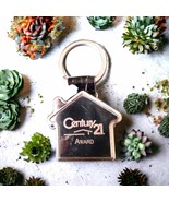 Silver century 21 vintage keychain - $443.26 MXN