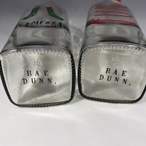 Set Of 2 Rae Dunn COMFORT FUN Glass Bail &amp; Trigger Bottles Decanters Christmas - £14.84 GBP