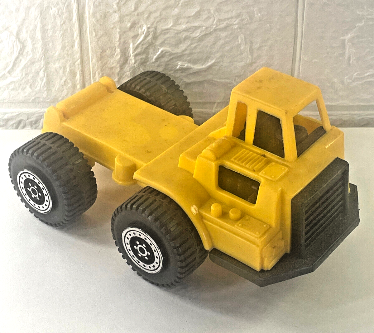 Primary image for Vintage Tootsie Toys Yellow Truck Toy Plastic