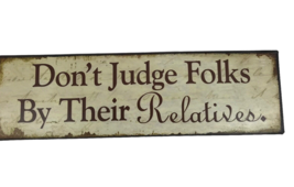 Funny Wall Plaque sign Metal Dont Judge Folks By Their Relatives Distressed - $14.80
