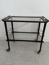 Wood, glass and brass service trolley, 1950s-
show original title

Origi... - $8,471.30 MXN