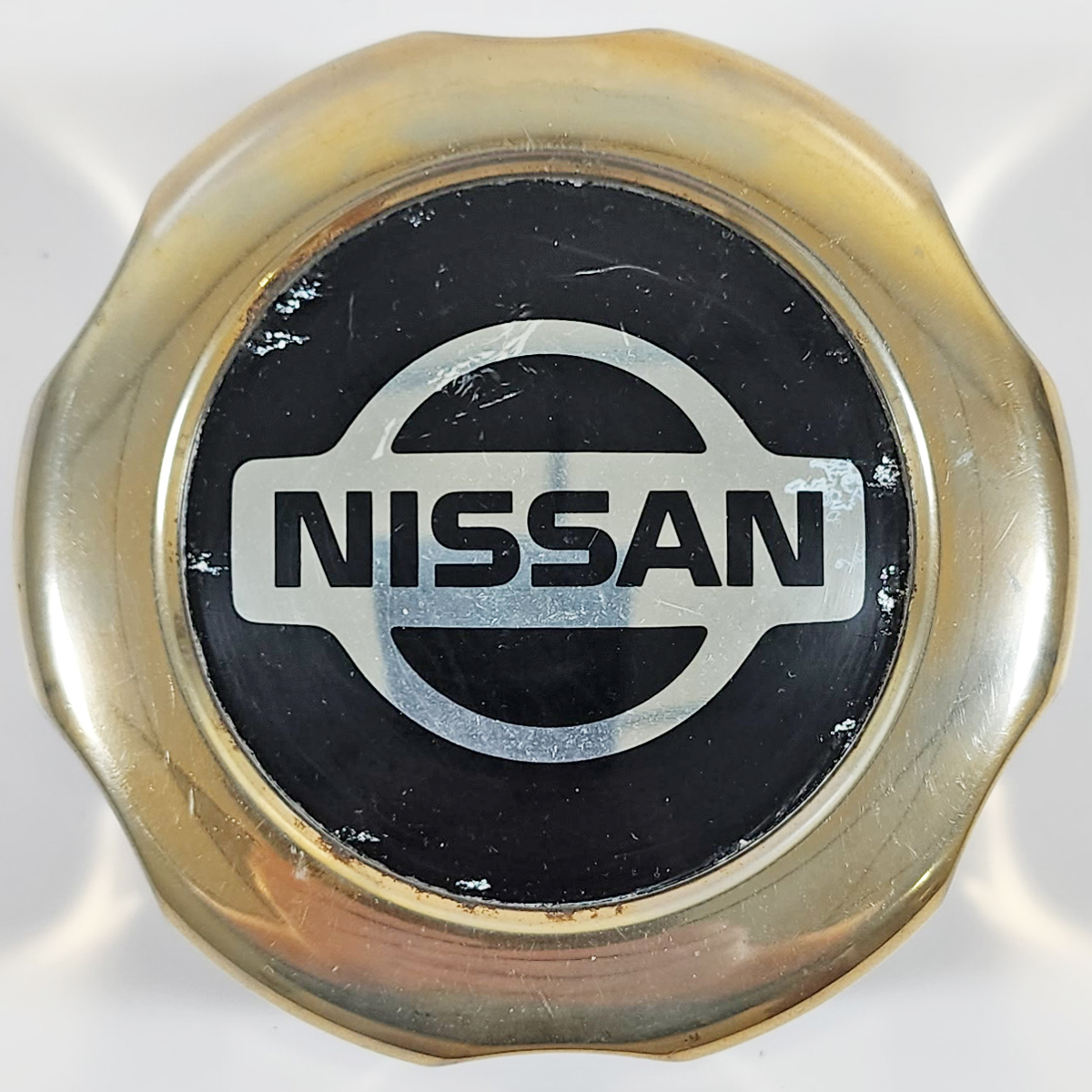 ONE 1996-1999 Nissan Pickup / Pathfinder # 62344 Gold Center Cap # 40315-89P15 - $59.99