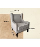 Modern Wingback Chair with Gray Upholstery and Nailhead Trim - $450.00