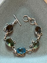 Brown Green &amp; Blue Oval Faceted Glass in Nonmagnetic Silver Frame LInk Bracelet - $19.45