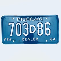 2004 United States Michigan Base Dealer License Plate 703D86 - £13.23 GBP
