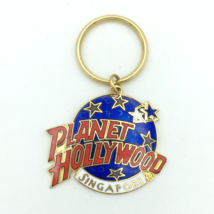 PLANET HOLLYWOOD Singapore collectible keychain - red white blue metal enamel - $10.00