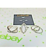 BEBE Women&#39;s Silver Tone Bands W White Fashion Ring Set 4 Pieces Size 7.... - $22.48 CAD
