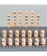 56x Heads with Expressive Facial Features - Build your own minifigure - $14.00
