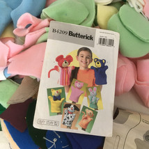 Various cut fabric and pattern pieces for Butterick B4209 soft stuff han... - $19.75