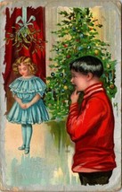 Vintage Christmas Postcard Cute Kids by the Christmas Tree Postmarked 1909 - £15.94 GBP