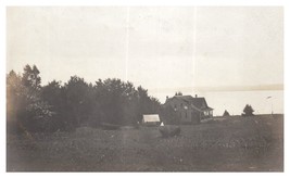 Old black and white photo of a home next to a lake RPPC Postcard - £5.40 GBP