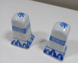 2 1/2 inch white and blue salt and pepper shakers missing stopers - $5.94