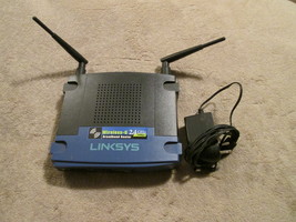 Linksys router wrt54gl with power cord - $25.00