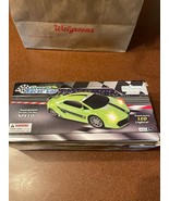 art creativity green race car - $272.87 MXN
