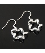 Open Star Fashion Earrings - $56.26 MXN