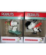 NEW Lot of 2 Hallmark Snoopy Ornaments Peanuts 2021 Snoopy Sledding &amp; Ic... - $418.00 MXN