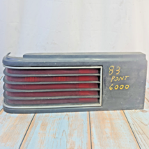 GM 16500342 Pontiac 1982-1983 6000 LH Driver Tail Light Assembly Dark Gr... - $40.47