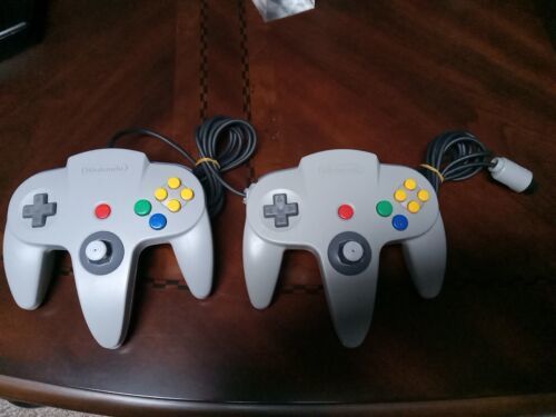 Primary image for Lot Of 2 Nintendo 64 N64 Gray Controller Authentic OEM Tested Tight Sticks