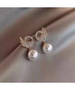 Dangle drop swan pearl earrings Plus FREE 2 pearl hair clips till it las... - £11.85 GBP