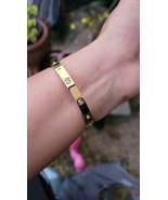 Gold-plated stainless steel bracelet with zircon inlay. / Pulsera de ace... - $279.31 MXN