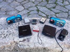 Lot of 4 radio transistors, 2 radios, 1 portable CD player, 1 DVD recorder  - $60.00