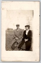 RPPC Handsome Man Trench Coat Lovely Young Woman in Field Postcard D26 - $9.95