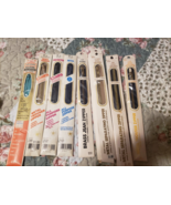 Lot of 8 Zippers in unopened packages. - $373.00 MXN