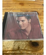 Elvis Presley Commemorative Issue: The Number One Hits CD - $110.22 MXN