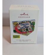 HALLMARK CHRISTMAS ORNAMENT: HASBRO CHUTES AND LADDERS FAMILY GAME NIGHT... - $32.49 CAD