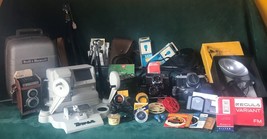 Various cameras, projector and screen, film splicer, plus accessories - $750.00